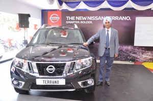 Satinder Singh Bajwa, Vice President – Sales, Network and Customer Relations, Nissan Motor India Pvt. Ltd posing with the new Nissan Terrano